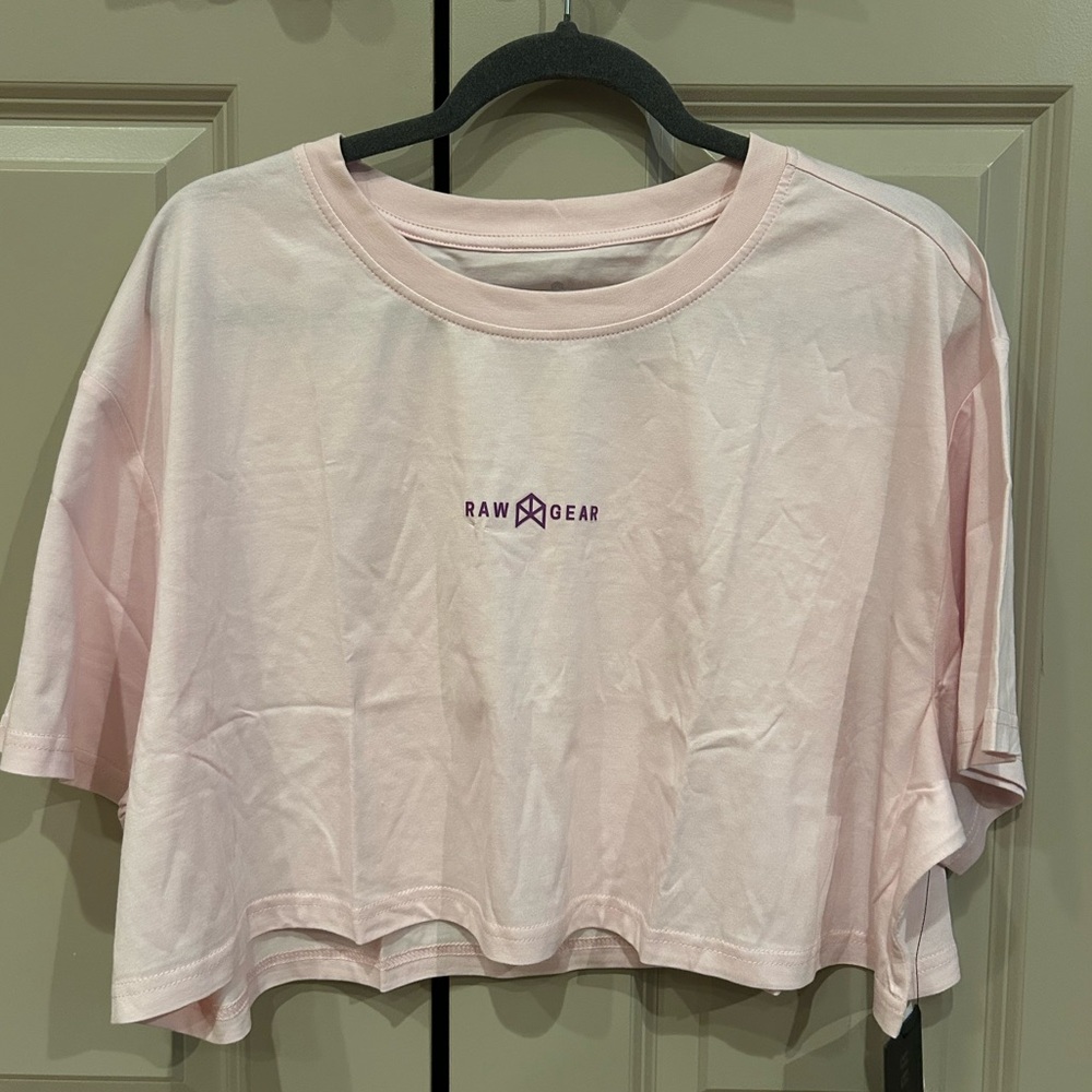 Brand new Raw Gear baby pink crop top